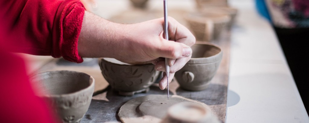 Image of a person making cups and saucers. Photo from Andy Kelly